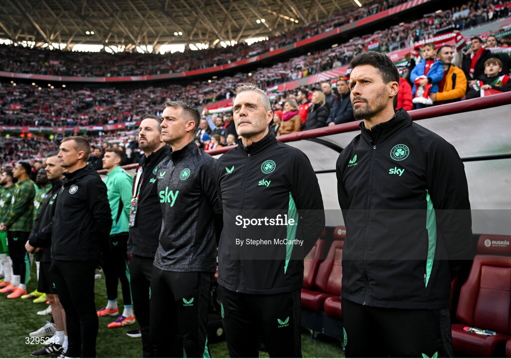 16 November 2025; Republic of Ireland staff, from right, assistant coach Paddy McCarthy, goalkeeping coach Gudmundur Hreidarsson, head of athletic performance Damien Doyle, analyst Ger Dunne and lead physiotherapist Danny Miller before the FIFA World Cup 2026 Group F Qualifier match between Hungary and Republic of Ireland at Puskás Aréna in Budapest, Hungary. Photo by Stephen McCarthy/Sportsfile