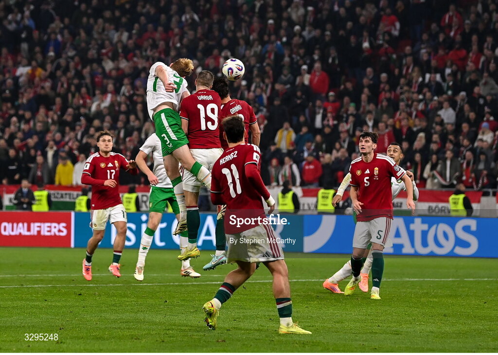 16 November 2025; Liam Scales of Republic of Ireland heads on in the build up to team-mate Troy Parrott scoring their third goal during the FIFA World Cup 2026 Group F Qualifier match between Hungary and Republic of Ireland at Puskás Aréna in Budapest, Hungary. Photo by Stephen McCarthy/Sportsfile