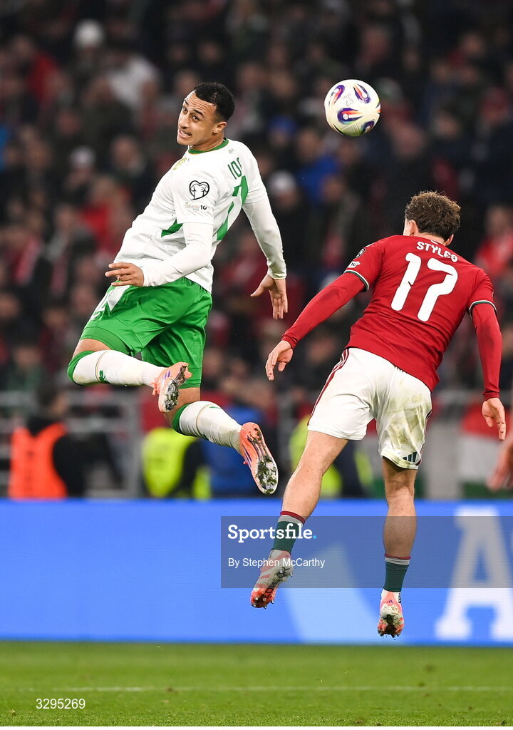 16 November 2025; Adam Idah of Republic of Ireland in action against Callum Styles of Hungary during the FIFA World Cup 2026 Group F Qualifier match between Hungary and Republic of Ireland at Puskás Aréna in Budapest, Hungary. Photo by Stephen McCarthy/Sportsfile