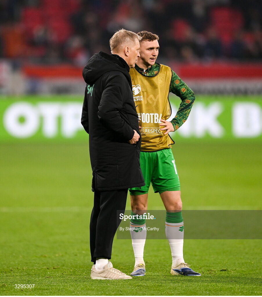 16 November 2025; Republic of Ireland head coach Heimir Hallgrimsson speaks to Jack Taylor at half-time of the FIFA World Cup 2026 Group F Qualifier match between Hungary and Republic of Ireland at Puskás Aréna in Budapest, Hungary. Photo by Stephen McCarthy/Sportsfile