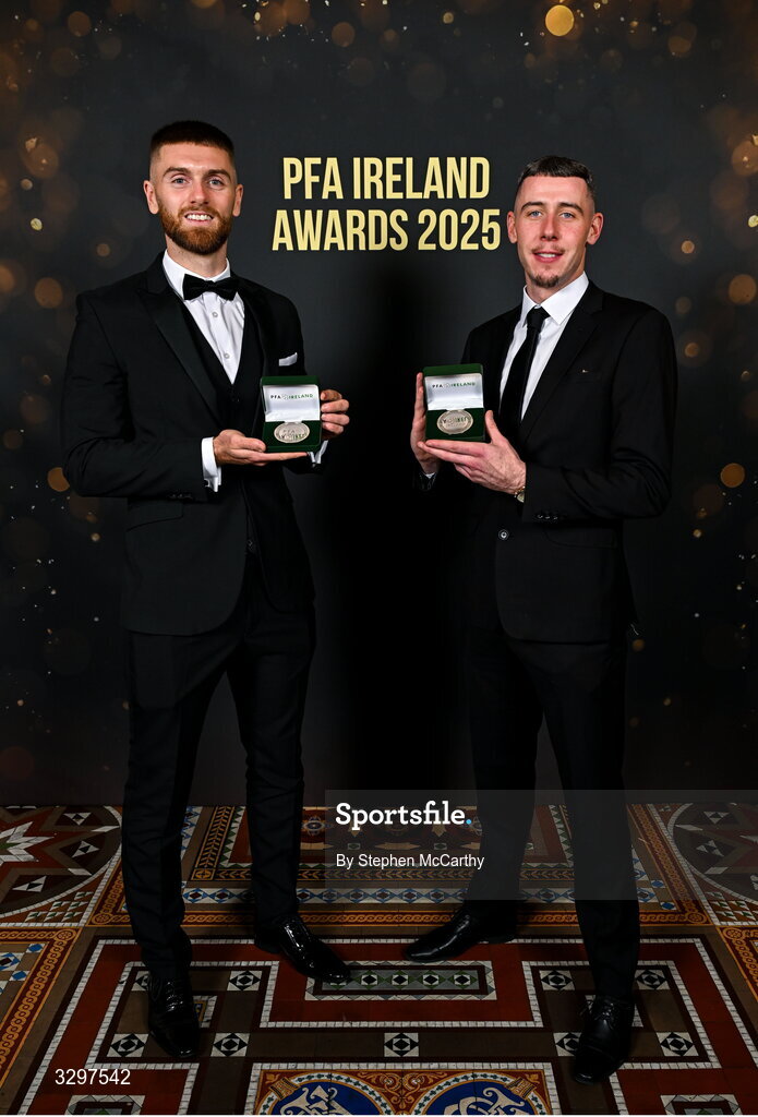 22 November 2025; Drogheda United players Conor Keeley, left, and Luke Dennison with their PFA Ireland Men’s Premier Division Team of the Year 2025 medals during the PFA Ireland Awards 2025 at The College Green Hotel in Dublin. Photo by Stephen McCarthy/Sportsfile
