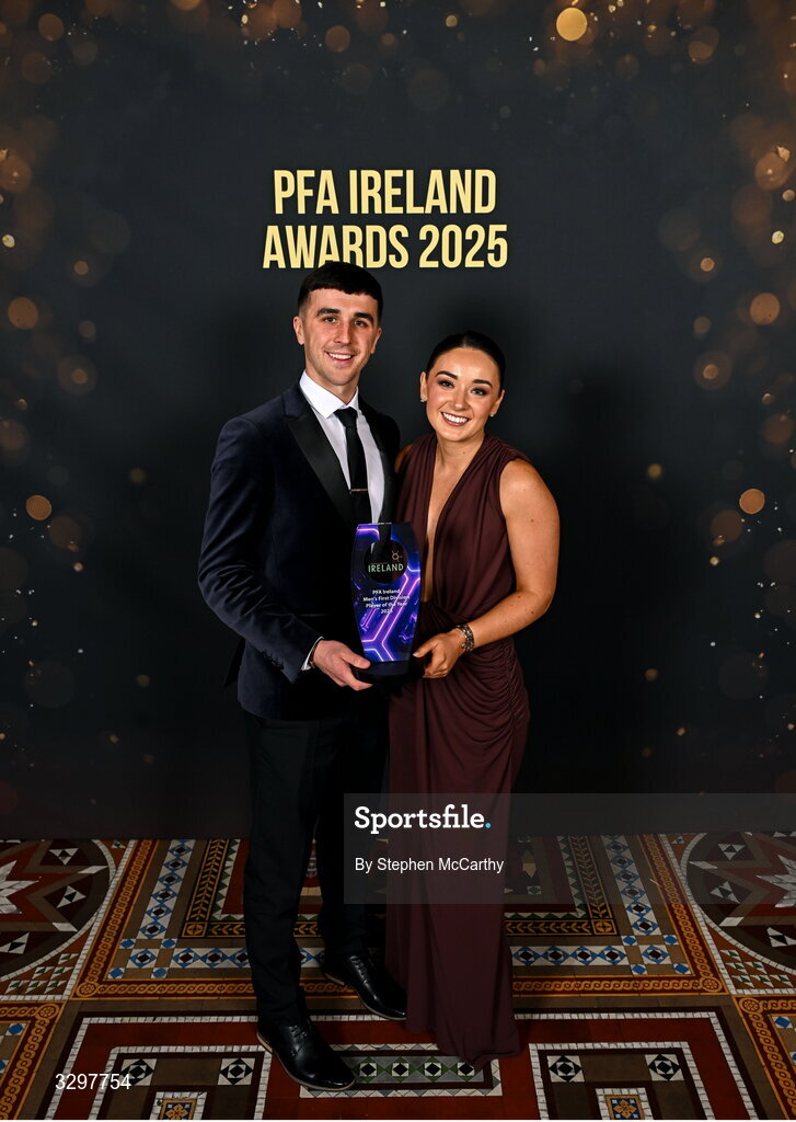 22 November 2025; Barry Coffey of Cobh Ramblers with Aoife Tynan and his PFA Ireland Men’s First Division Player of the Year 2025 award during the PFA Ireland Awards 2025 at The College Green Hotel in Dublin. Photo by Stephen McCarthy/Sportsfile