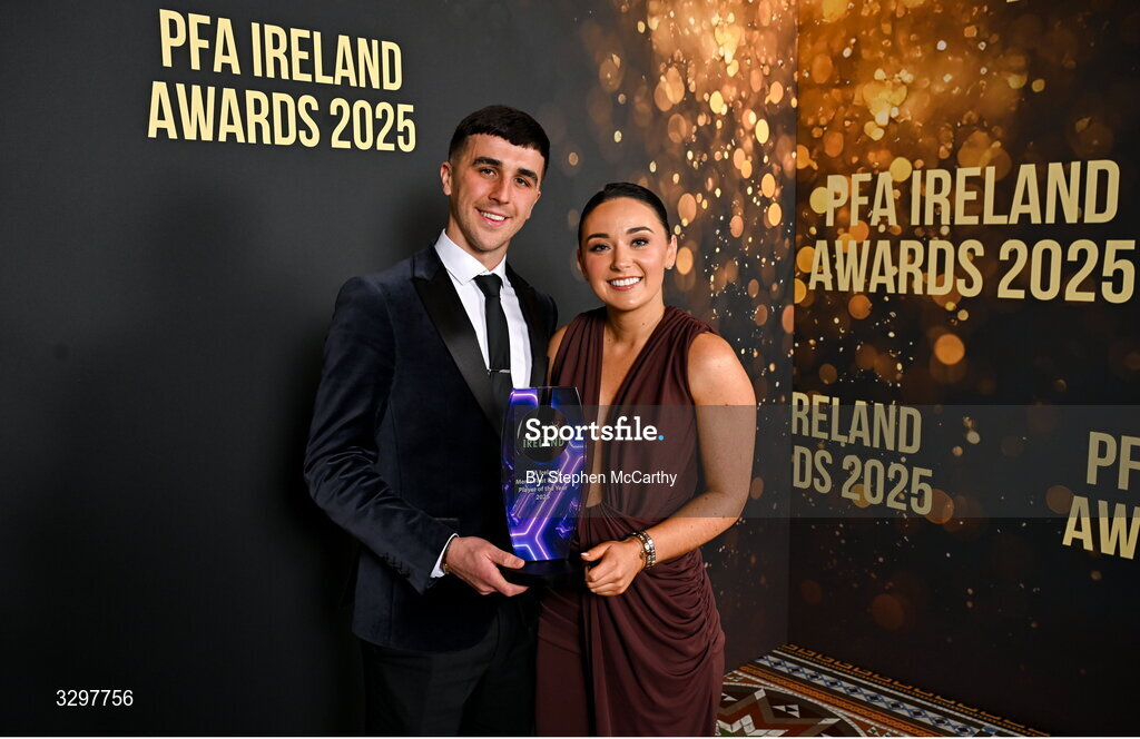 22 November 2025; Barry Coffey of Cobh Ramblers with Aoife Tynan and his PFA Ireland Men’s First Division Player of the Year 2025 award during the PFA Ireland Awards 2025 at The College Green Hotel in Dublin. Photo by Stephen McCarthy/Sportsfile