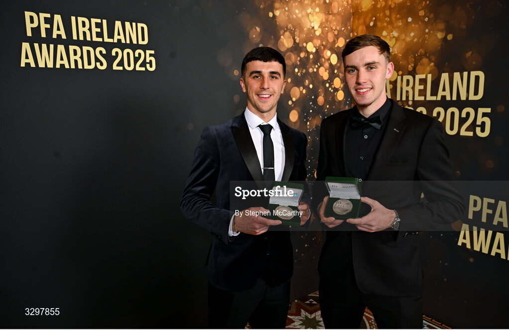22 November 2025; Barry Coffey of Cobh Ramblers with his PFA Ireland Men's First Division Team of the Year 2025 medal, left, and Matt Healy of Shamrock Rovers with his PFA Ireland Men’s Premier Division Team of the Year 2025 medal during the PFA Ireland Awards 2025 at The College Green Hotel in Dublin. Photo by Stephen McCarthy/Sportsfile