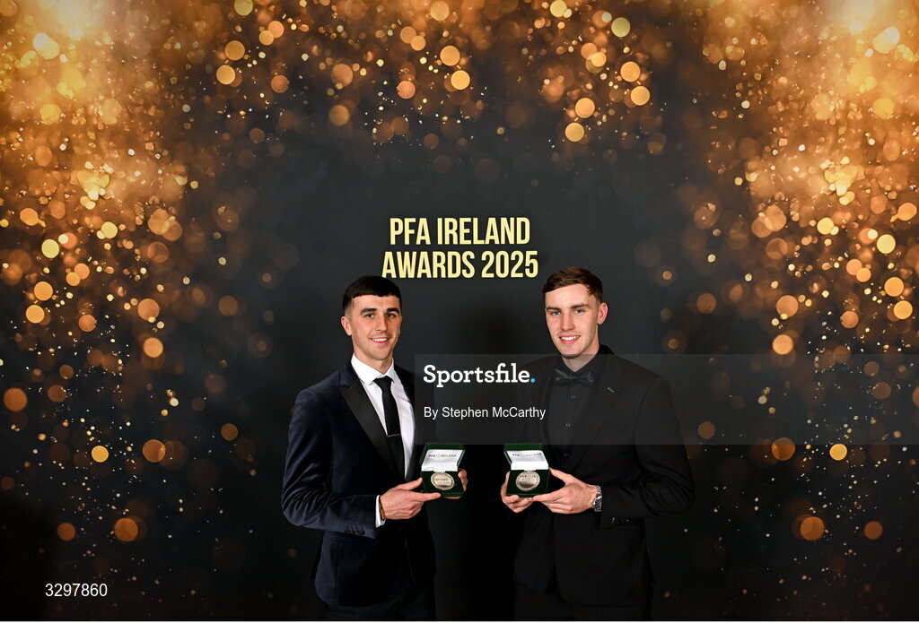 22 November 2025; Barry Coffey of Cobh Ramblers with his PFA Ireland Men's First Division Team of the Year 2025 medal, left, and Matt Healy of Shamrock Rovers with his PFA Ireland Men’s Premier Division Team of the Year 2025 medal during the PFA Ireland Awards 2025 at The College Green Hotel in Dublin. Photo by Stephen McCarthy/Sportsfile