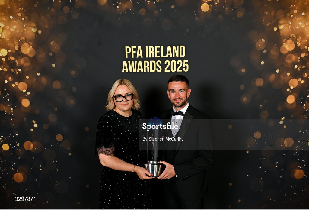 22 November 2025; Michael Duffy of Derry City is presented with his PFA Ireland Men’s Player of the Year 2025 award by Ciara Murray, Sports Direct, during the PFA Ireland Awards 2025 at The College Green Hotel in Dublin. Photo by Stephen McCarthy/Sportsfile