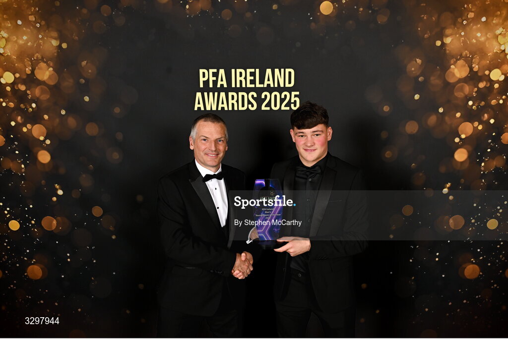 22 November 2025; Owen Elding of Sligo Rovers is presented with the PFA Ireland Men’s Young Player of the Year 2025 award by Republic of Ireland U21 manager Jim Crawford during the PFA Ireland Awards 2025 at The College Green Hotel in Dublin. Photo by Stephen McCarthy/Sportsfile