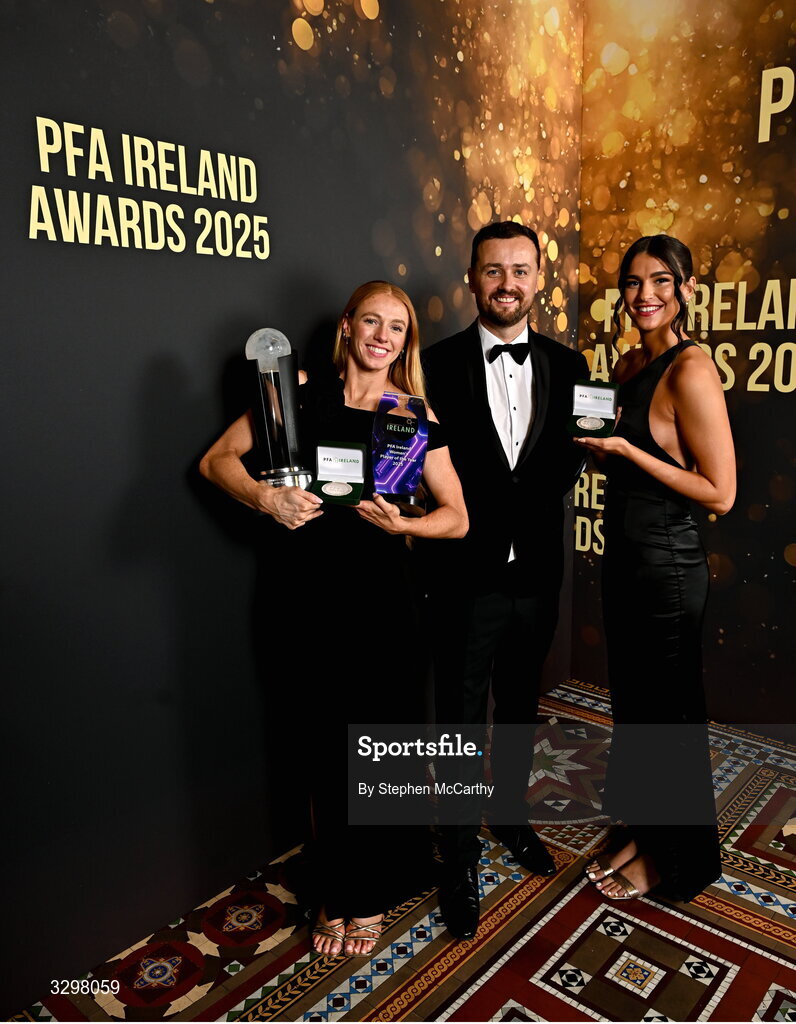 22 November 2025; Stephen Bent with Kelly Brady of Athlone Town, holding her PFA Ireland Women’s Player of the Year 2025 and PFA Ireland Women’s Premier Division Team of the Year 2025 awards, and Maria Reynolds of Shamrock Rovers, holding her PFA Ireland Women’s Premier Division Team of the Year 2025 medal, during the PFA Ireland Awards 2025 at The College Green Hotel in Dublin. Photo by Stephen McCarthy/Sportsfile