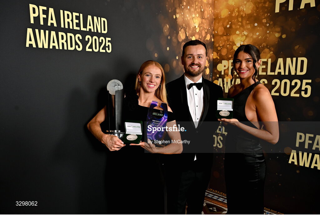 22 November 2025; Stephen Bent with Kelly Brady of Athlone Town, holding her PFA Ireland Women’s Player of the Year 2025 and PFA Ireland Women’s Premier Division Team of the Year 2025 awards, and Maria Reynolds of Shamrock Rovers, holding her PFA Ireland Women’s Premier Division Team of the Year 2025 medal, during the PFA Ireland Awards 2025 at The College Green Hotel in Dublin. Photo by Stephen McCarthy/Sportsfile