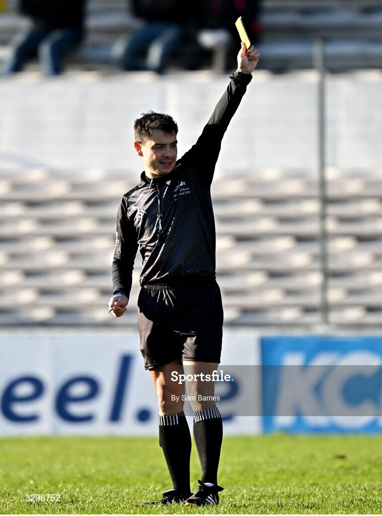 23 November 2025; Referee Caymon Flynn shows a yellow card to Ronan Corcoran of Shamrocks Ballyhale, not pictured, during the AIB Leinster GAA Hurling Senior Club Championship semi-final match between Shamrocks Ballyhale and Clough Ballacolla at UPMC Nowlan Park in Kilkenny. Photo by Sam Barnes/Sportsfile