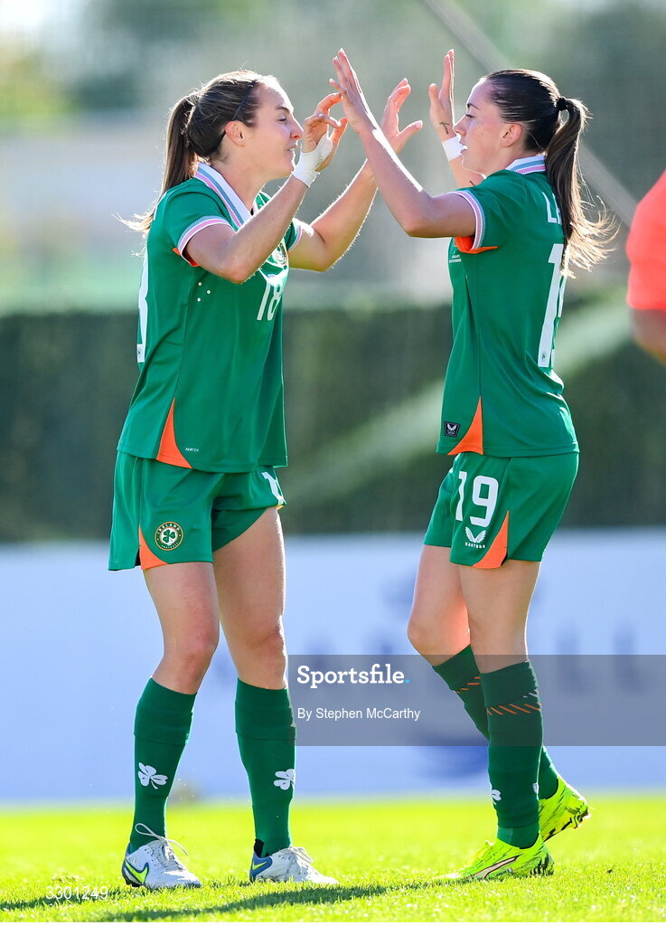 29 November 2025; Abbie Larkin of Republic of Ireland with teammate Kyra Carusa, left, after scoring their side's first goal during the women's international friendly match between Republic of Ireland and Hungary at Marbella Football Centre in Marbella, Spain. Photo by Stephen McCarthy/Sportsfile