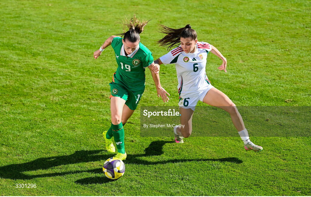 29 November 2025; Abbie Larkin of Republic of Ireland in action against Borbala Vincze of Hungary during the women's international friendly match between Republic of Ireland and Hungary at Marbella Football Centre in Marbella, Spain. Photo by Stephen McCarthy/Sportsfile