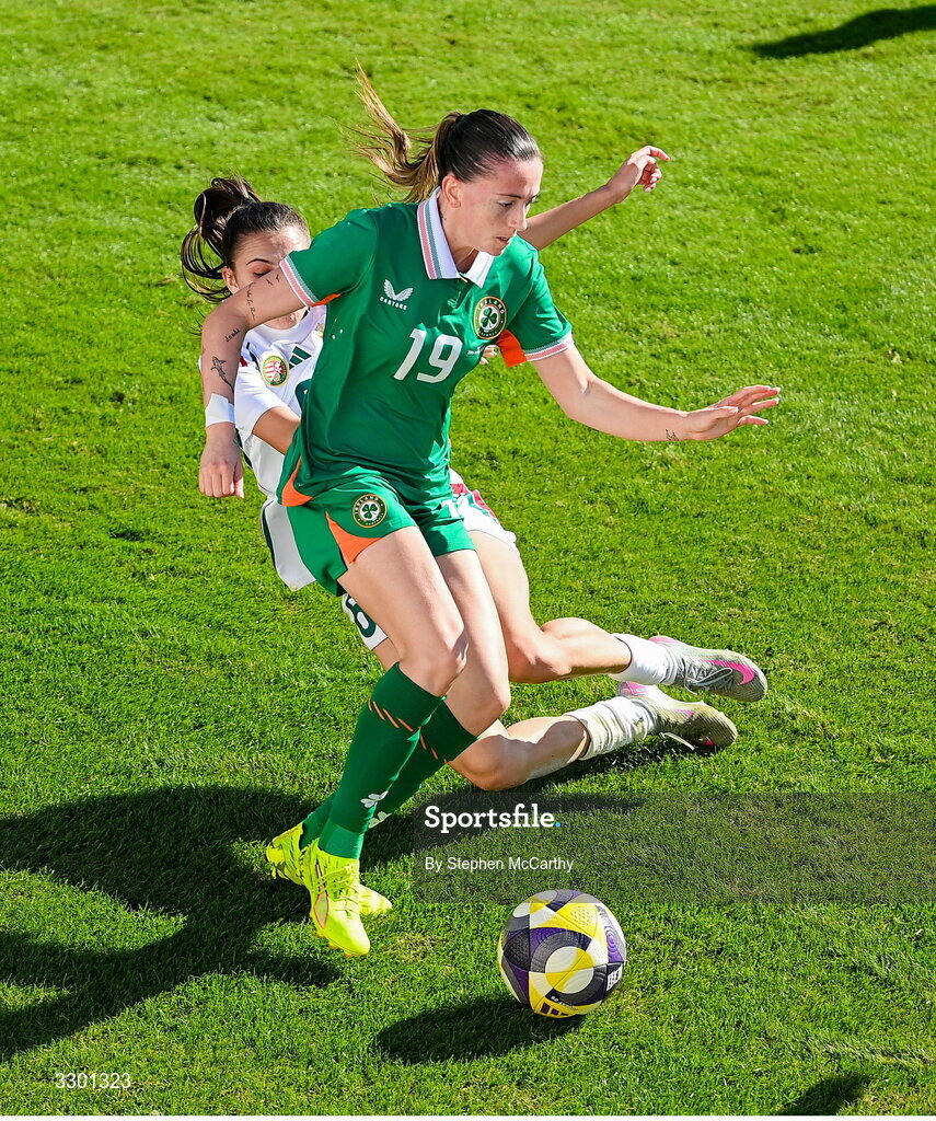 29 November 2025; Abbie Larkin of Republic of Ireland in action against Borbala Vincze of Hungary during the women's international friendly match between Republic of Ireland and Hungary at Marbella Football Centre in Marbella, Spain. Photo by Stephen McCarthy/Sportsfile