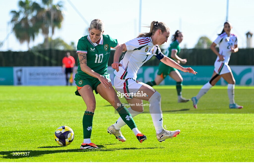29 November 2025; Denise O’Sullivan of Republic of Ireland in action against Henrietta Csiszar of Hungary during the women's international friendly match between Republic of Ireland and Hungary at Marbella Football Centre in Marbella, Spain. Photo by Stephen McCarthy/Sportsfile