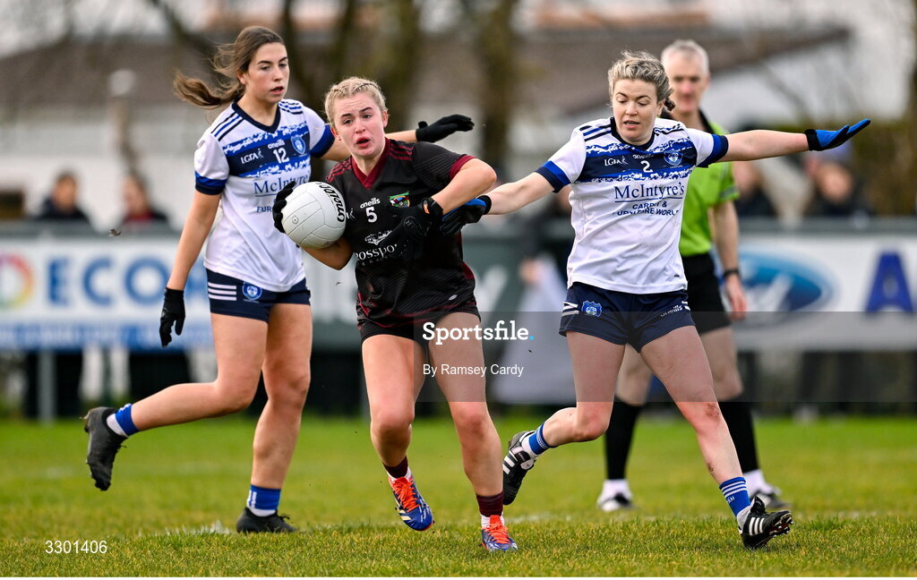 29 November 2025; Sian Corkery of Cromane in action against Genevieve Keogan of Cavan Gaels during the AIB All-Ireland Ladies Football Club Junior Club Championship semi-final match between Cavan Gaels of Cavan and Cromane of Kerry at Terry Coyle Park in Cavan. Photo by Ramsey Cardy/Sportsfile