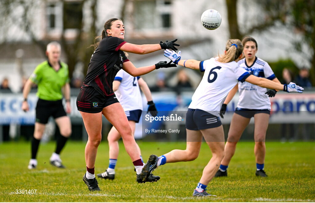29 November 2025; Mary Kate Smith of Cromane in action against Niamh Briody of Cavan Gaels during the AIB All-Ireland Ladies Football Club Junior Club Championship semi-final match between Cavan Gaels of Cavan and Cromane of Kerry at Terry Coyle Park in Cavan. Photo by Ramsey Cardy/Sportsfile