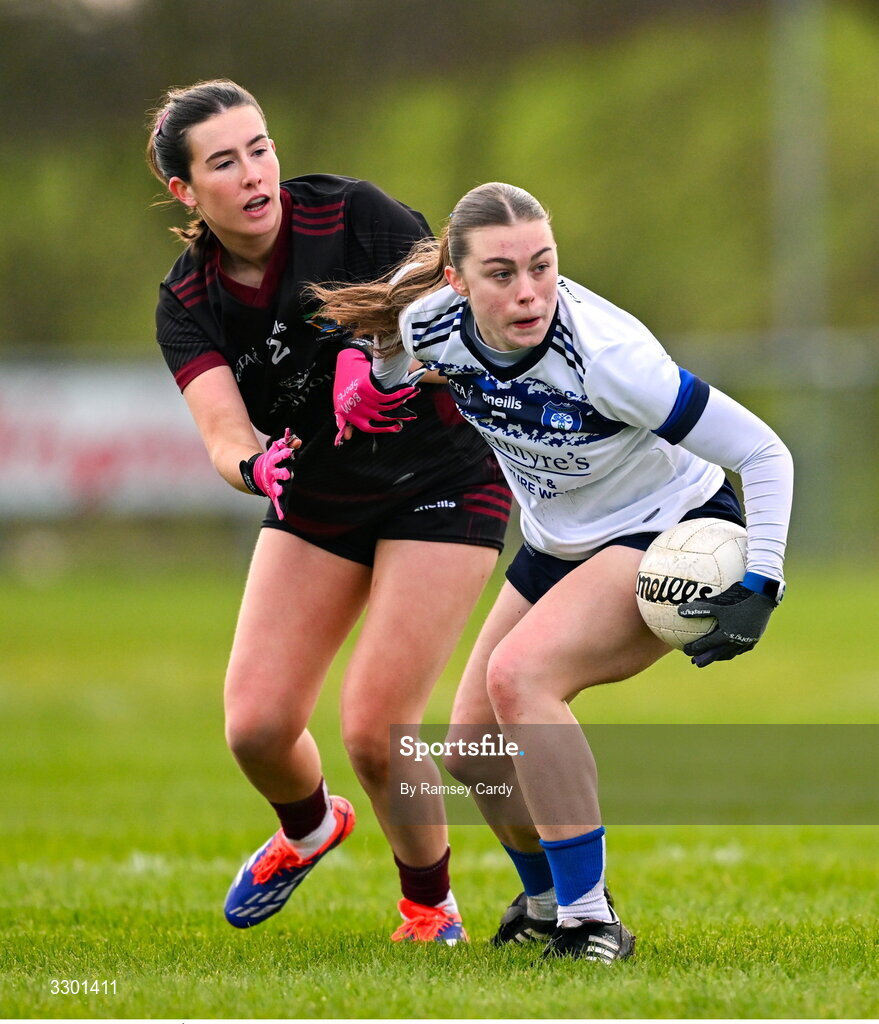 29 November 2025; Éinín Lawton of Cavan Gaels in action against Naoise Burke of Cromane during the AIB All-Ireland Ladies Football Club Junior Club Championship semi-final match between Cavan Gaels of Cavan and Cromane of Kerry at Terry Coyle Park in Cavan. Photo by Ramsey Cardy/Sportsfile