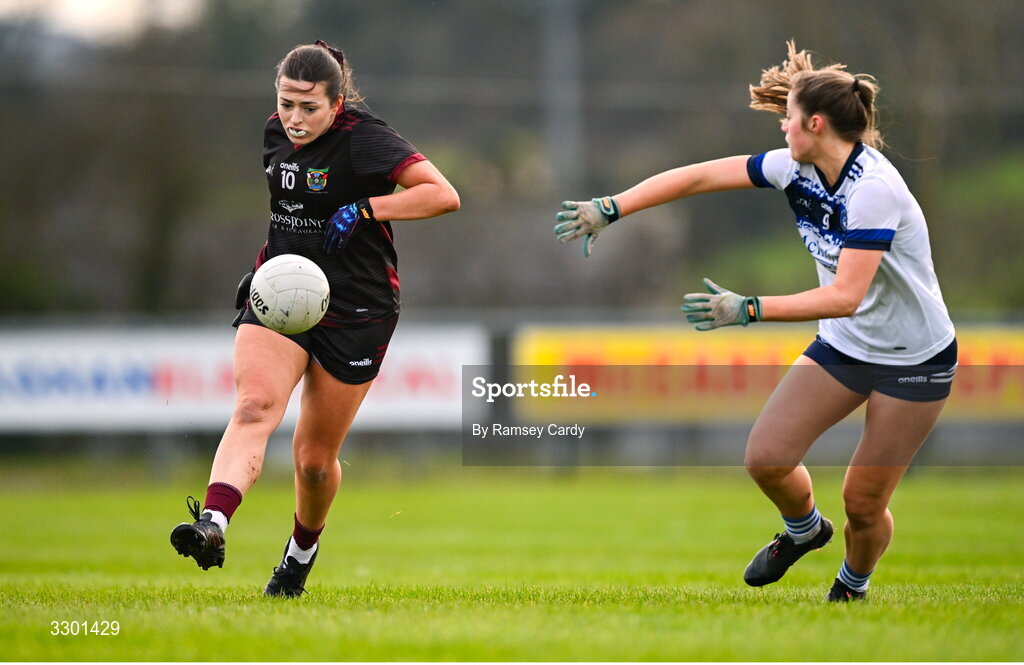 29 November 2025; Mairín Duffy of Cromane in action against Sarah Clarke of Cavan Gaels during the AIB All-Ireland Ladies Football Club Junior Club Championship semi-final match between Cavan Gaels of Cavan and Cromane of Kerry at Terry Coyle Park in Cavan. Photo by Ramsey Cardy/Sportsfile