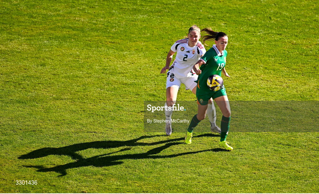 29 November 2025; Abbie Larkin of Republic of Ireland in action against Beatrix Fordos of Hungary during the women's international friendly match between Republic of Ireland and Hungary at Marbella Football Centre in Marbella, Spain. Photo by Stephen McCarthy/Sportsfile