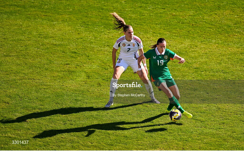 29 November 2025; Abbie Larkin of Republic of Ireland in action against Beatrix Fordos of Hungary during the women's international friendly match between Republic of Ireland and Hungary at Marbella Football Centre in Marbella, Spain. Photo by Stephen McCarthy/Sportsfile