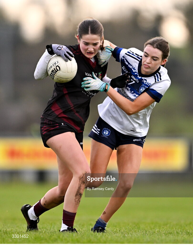 29 November 2025; Roisín Griffin of Cromane in action against Clodagh Doyle of Cavan Gaels during the AIB All-Ireland Ladies Football Club Junior Club Championship semi-final match between Cavan Gaels of Cavan and Cromane of Kerry at Terry Coyle Park in Cavan. Photo by Ramsey Cardy/Sportsfile