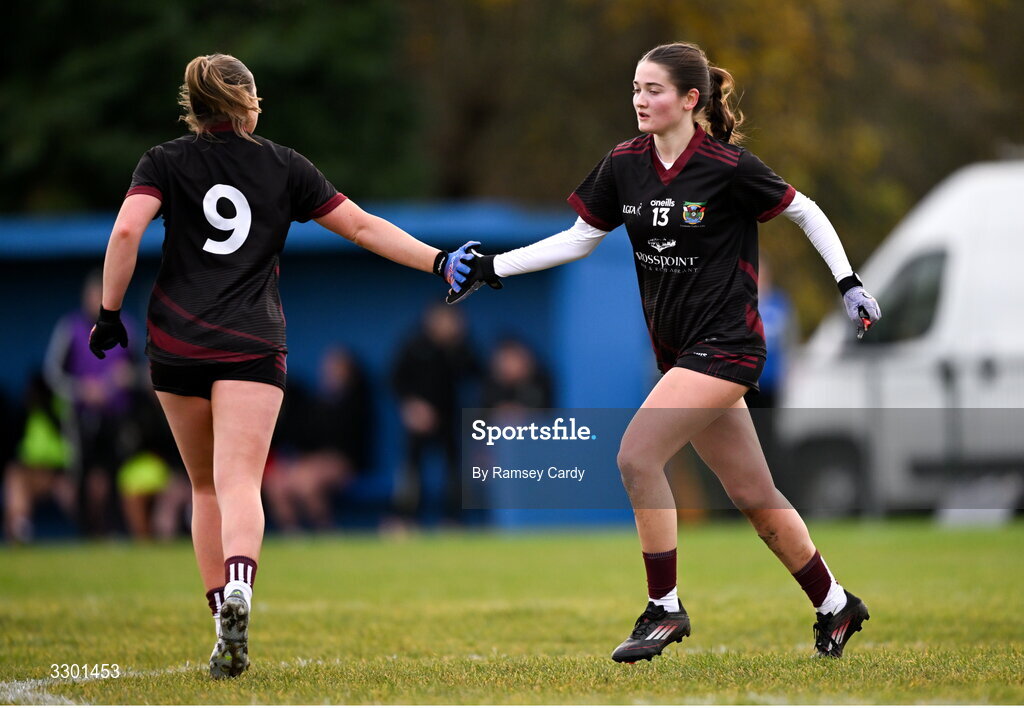 29 November 2025; Roisín Griffin of Cromane is congratulated by teammate Roisín Smith, left, after kicking a point during the AIB All-Ireland Ladies Football Club Junior Club Championship semi-final match between Cavan Gaels of Cavan and Cromane of Kerry at Terry Coyle Park in Cavan. Photo by Ramsey Cardy/Sportsfile
