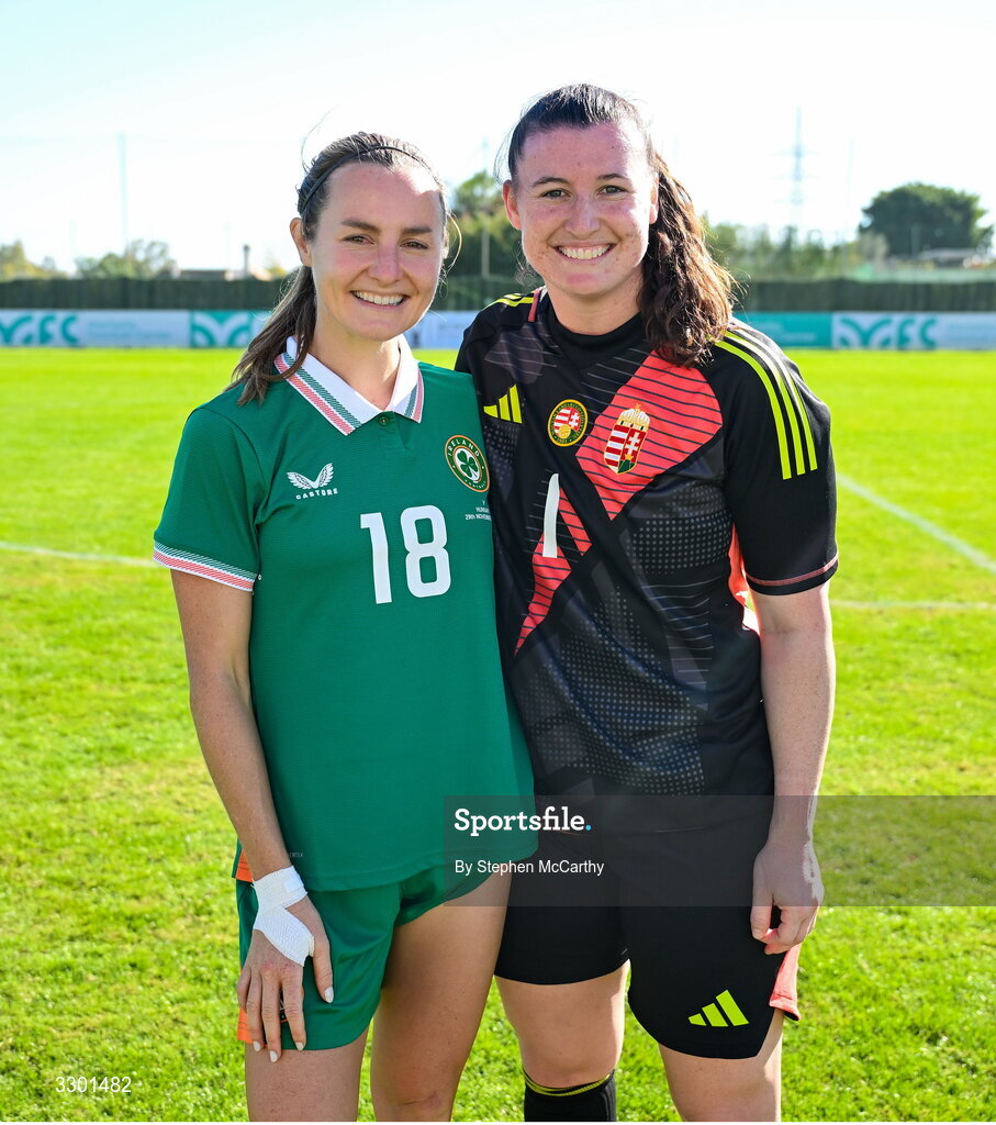 29 November 2025; Kyra Carusa of Republic of Ireland and Hungary goalkeeper Lauren Brzykcy after the women's international friendly match between Republic of Ireland and Hungary at Marbella Football Centre in Marbella, Spain. Photo by Stephen McCarthy/Sportsfile