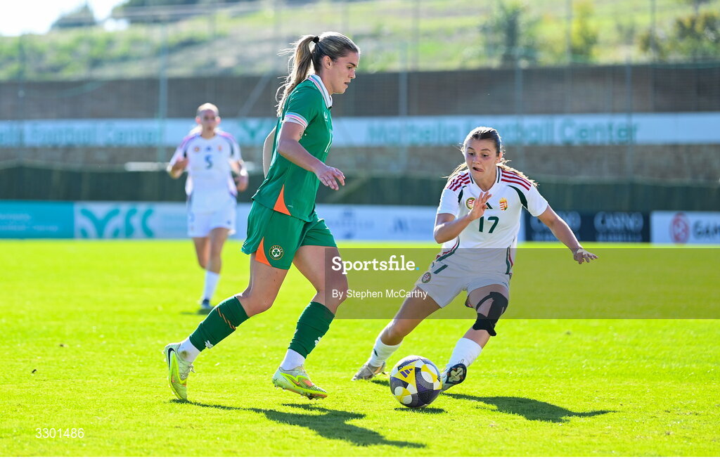 29 November 2025; Jamie Finn of Republic of Ireland and Zsofia Mayer of Hungary the women's international friendly match between Republic of Ireland and Hungary at Marbella Football Centre in Marbella, Spain. Photo by Stephen McCarthy/Sportsfile