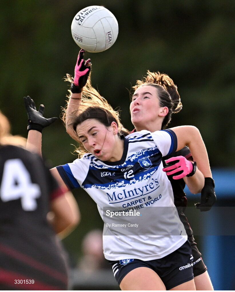 29 November 2025; Laura Galligan of Cavan Gaels in action against Naoise Burke of Cromane during the AIB All-Ireland Ladies Football Club Junior Club Championship semi-final match between Cavan Gaels of Cavan and Cromane of Kerry at Terry Coyle Park in Cavan. Photo by Ramsey Cardy/Sportsfile