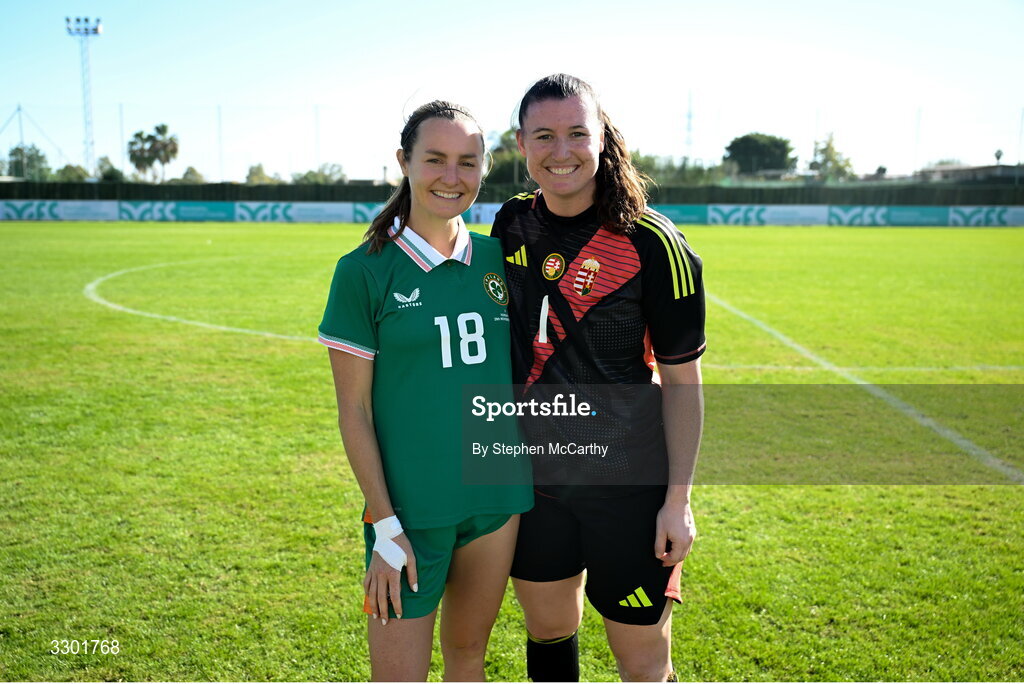 29 November 2025; Kyra Carusa of Republic of Ireland and Hungary goalkeeper Lauren Brzykcy after the women's international friendly match between Republic of Ireland and Hungary at Marbella Football Centre in Marbella, Spain. Photo by Stephen McCarthy/Sportsfile