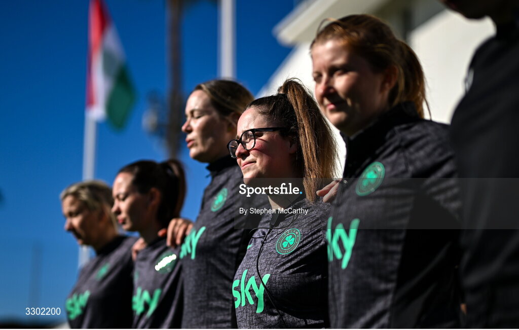 29 November 2025; Republic of Ireland performance analyst Rhianna Farr, second from right, stands for the playing of the National Anthem before the women's international friendly match between Republic of Ireland and Hungary at Marbella Football Centre in Marbella, Spain. Photo by Stephen McCarthy/Sportsfile