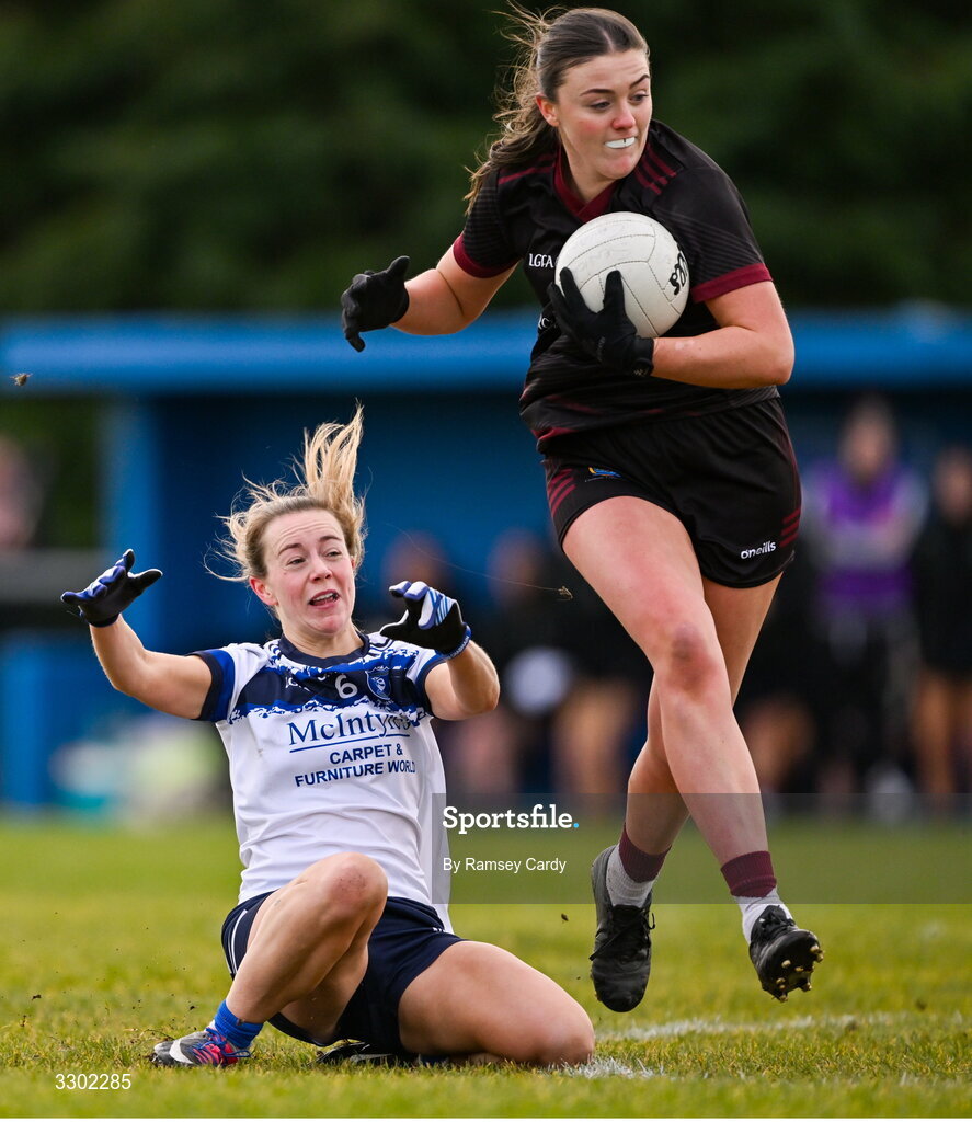 29 November 2025; Mary Kate Smith of Cromane evades the tackle of Niamh Briody of Cavan Gaels during the AIB All-Ireland Ladies Football Club Junior Club Championship semi-final match between Cavan Gaels of Cavan and Cromane of Kerry at Terry Coyle Park in Cavan. Photo by Ramsey Cardy/Sportsfile