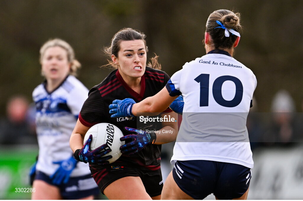 29 November 2025; Mairín Duffy of Cromane in action against Karla Brady of Cavan Gaels during the AIB All-Ireland Ladies Football Club Junior Club Championship semi-final match between Cavan Gaels of Cavan and Cromane of Kerry at Terry Coyle Park in Cavan. Photo by Ramsey Cardy/Sportsfile