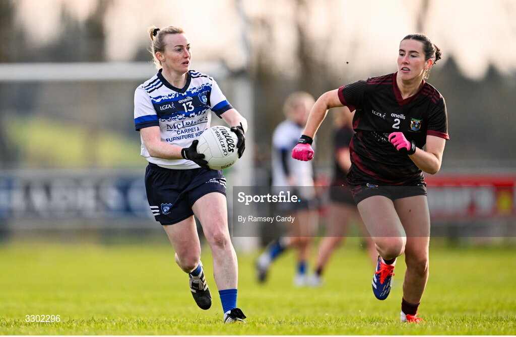 29 November 2025; Ciara Farrell of Cavan Gaels in action against Naoise Burke of Cromane during the AIB All-Ireland Ladies Football Club Junior Club Championship semi-final match between Cavan Gaels of Cavan and Cromane of Kerry at Terry Coyle Park in Cavan. Photo by Ramsey Cardy/Sportsfile