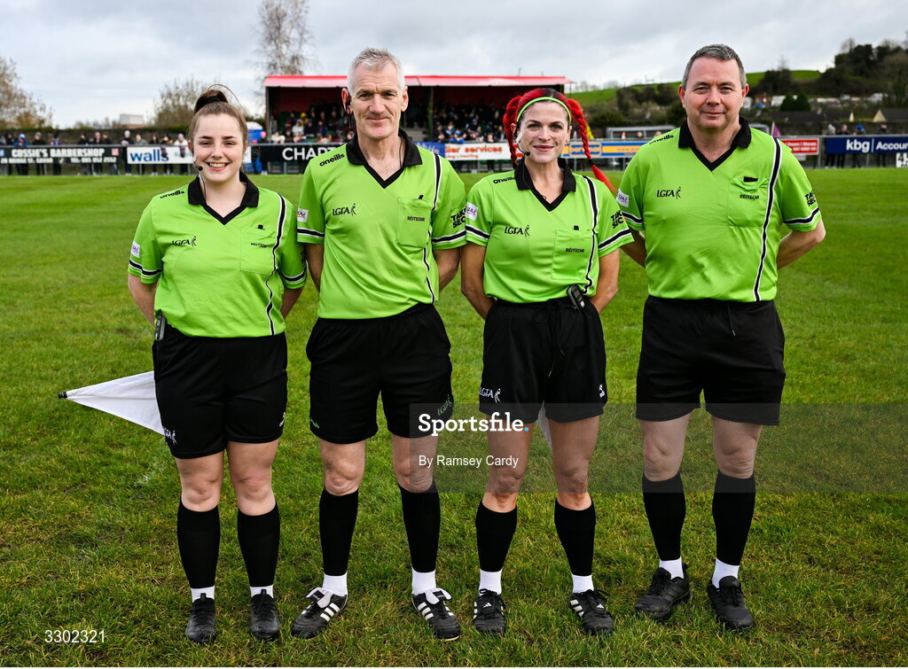 29 November 2025; Referee Philip Conway with lines people Roseanne Haughey and Janey McCauley, and standby referee Anthony Campbell before the AIB All-Ireland Ladies Football Club Junior Club Championship semi-final match between Cavan Gaels of Cavan and Cromane of Kerry at Terry Coyle Park in Cavan. Photo by Ramsey Cardy/Sportsfile