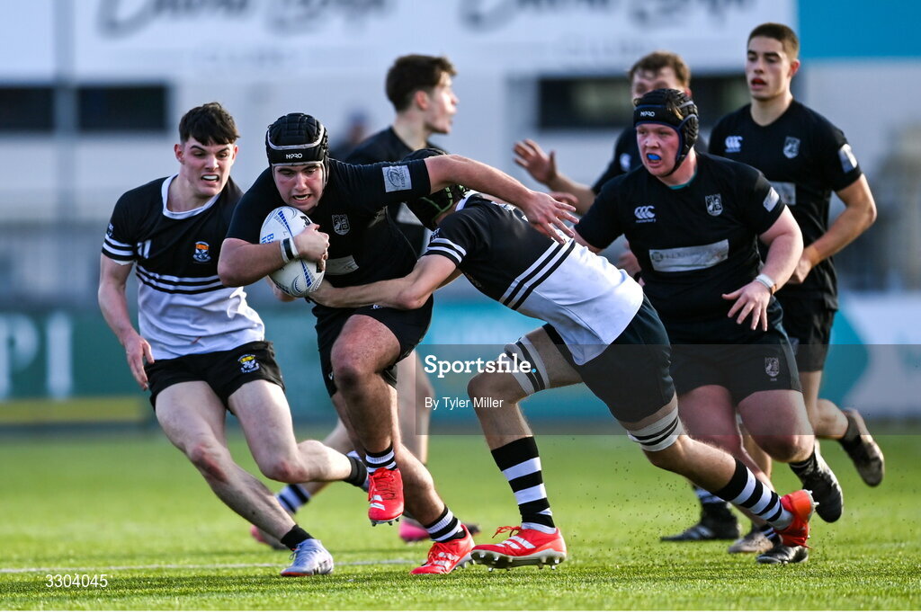 3 December 2025; Oscar Doody of Cistercian College Roscrea is tackled by Jack Garvey of Newbridge College during the Bank of Ireland Leinster Rugby Schools Senior League Division 1A semi-final match between Cistercian College Roscrea and Newbridge College at Energia Park in Dublin. Photo by Tyler Miller/Sportsfile