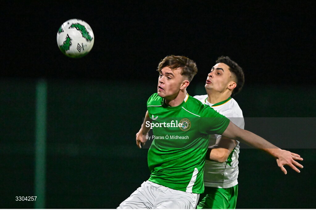 3 December 2025; Harvey Cullinan of Ireland Amateur, left, in action against Callum Lynch of Irish Defence Forces during the representative friendly match between Ireland Amateur and Irish Defence Forces at Wayside Celtic FC in Dublin. Photo by Piaras Ó Mídheach/Sportsfile