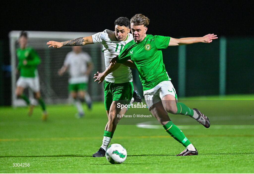 3 December 2025; Harvey Cullinan of Ireland Amateur, right, in action against Callum Lynch of Irish Defence Forces during the representative friendly match between Ireland Amateur and Irish Defence Forces at Wayside Celtic FC in Dublin. Photo by Piaras Ó Mídheach/Sportsfile