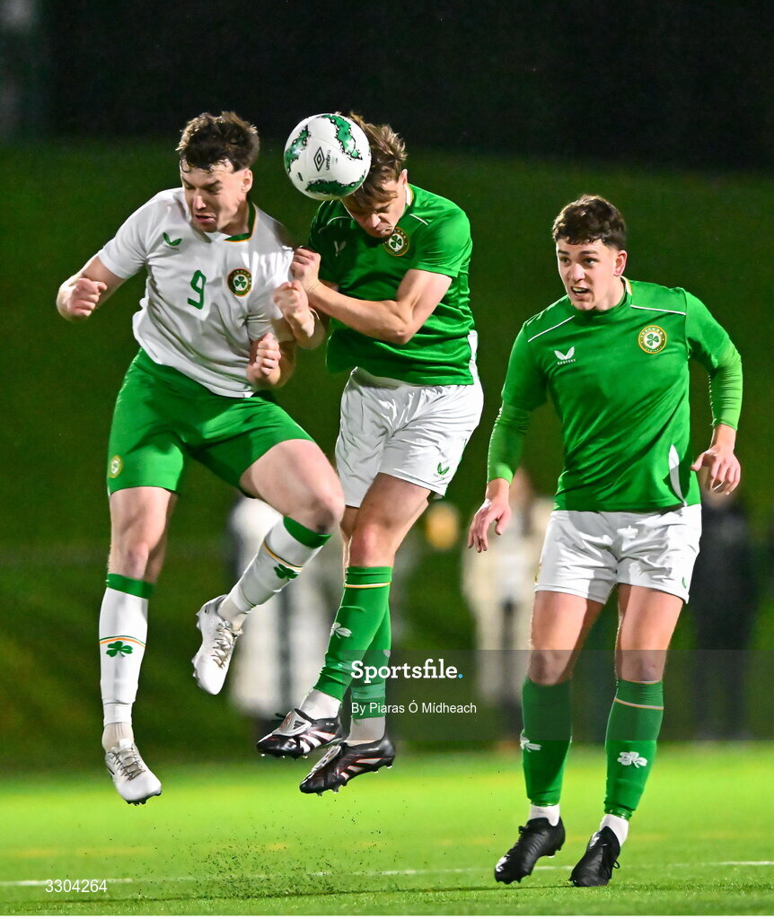 3 December 2025; Ronan Kierns of Irish Defence Forces, left, and Harvey Cullinan of Ireland Amateur during the representative friendly match between Ireland Amateur and Irish Defence Forces at Wayside Celtic FC in Dublin. Photo by Piaras Ó Mídheach/Sportsfile