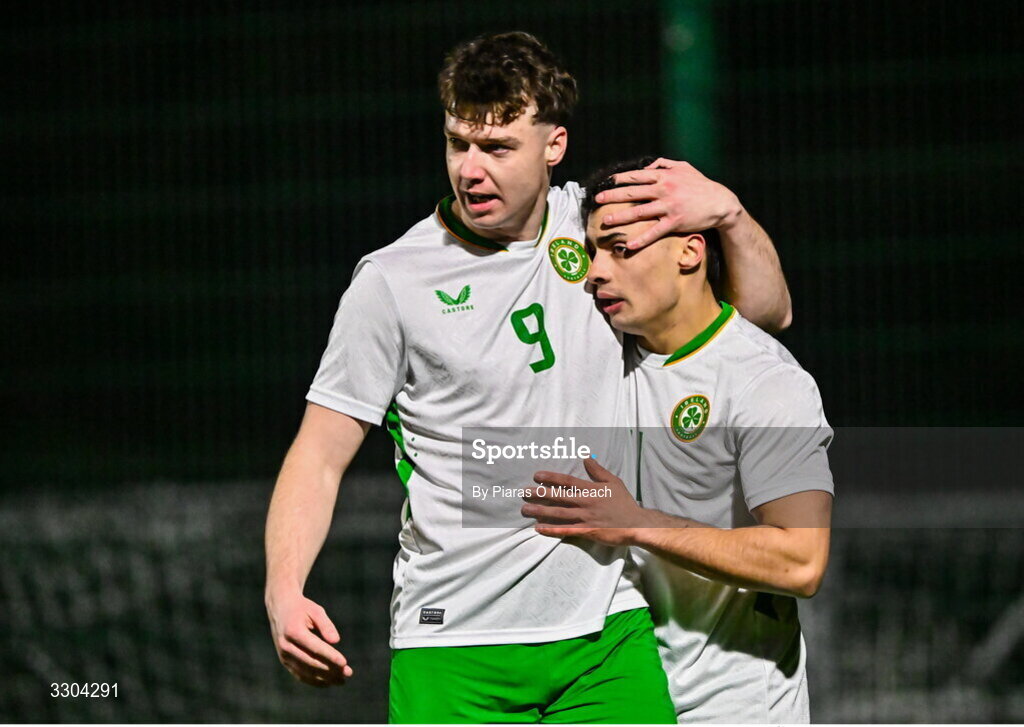 3 December 2025; Callum Lynch of Irish Defence Forces, right, celebrates with team-mate Ronan Kierns after scoring his side's first goal during the representative friendly match between Ireland Amateur and Irish Defence Forces at Wayside Celtic FC in Dublin. Photo by Piaras Ó Mídheach/Sportsfile