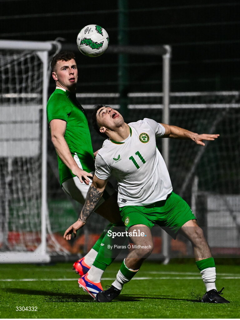 3 December 2025; Callum Lynch of Irish Defence Forces, right, in action against Jake Dillon of Ireland Amateur during the representative friendly match between Ireland Amateur and Irish Defence Forces at Wayside Celtic FC in Dublin. Photo by Piaras Ó Mídheach/Sportsfile