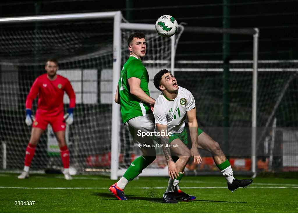 3 December 2025; Callum Lynch of Irish Defence Forces, right, in action against Jake Dillon of Ireland Amateur during the representative friendly match between Ireland Amateur and Irish Defence Forces at Wayside Celtic FC in Dublin. Photo by Piaras Ó Mídheach/Sportsfile