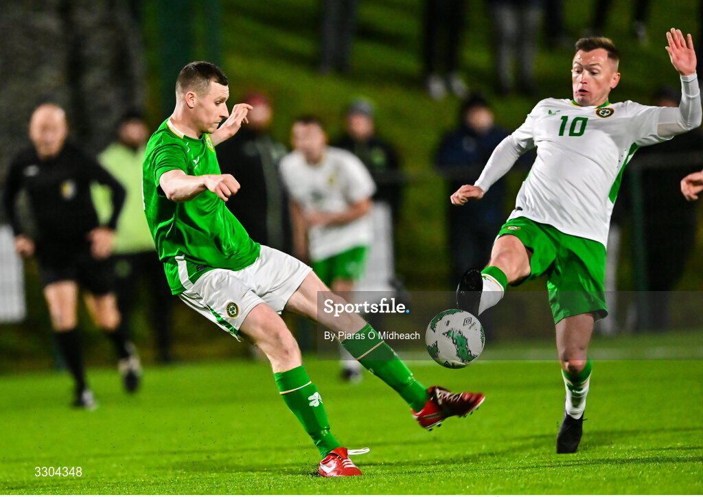 3 December 2025; Dean Walsh of Ireland Amateur and Adrian Rafferty of Irish Defence Forces, right, during the representative friendly match between Ireland Amateur and Irish Defence Forces at Wayside Celtic FC in Dublin. Photo by Piaras Ó Mídheach/Sportsfile