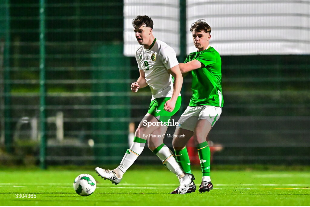 3 December 2025; Ronan Kierns of Irish Defence Forces in action against Harvey Cullinan of Ireland Amateur during the representative friendly match between Ireland Amateur and Irish Defence Forces at Wayside Celtic FC in Dublin. Photo by Piaras Ó Mídheach/Sportsfile