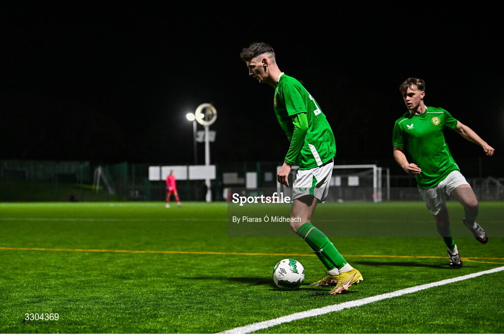 3 December 2025; Adam Delurey of Ireland Amateur, supported by team-mate Harvey Cullinan, right, during the representative friendly match between Ireland Amateur and Irish Defence Forces at Wayside Celtic FC in Dublin. Photo by Piaras Ó Mídheach/Sportsfile