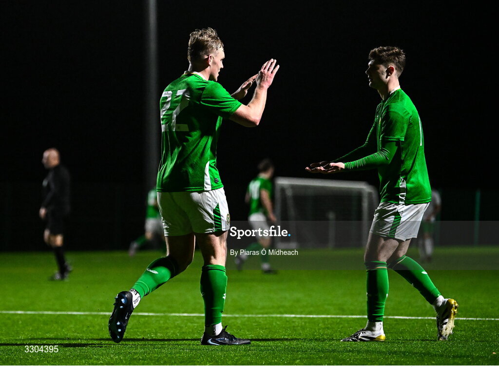 3 December 2025; Ed O’Dwyer of Ireland Amateur, left, celebrates with team-mate Brian Aherne after scoring their side's first goal during the representative friendly match between Ireland Amateur and Irish Defence Forces at Wayside Celtic FC in Dublin. Photo by Piaras Ó Mídheach/Sportsfile