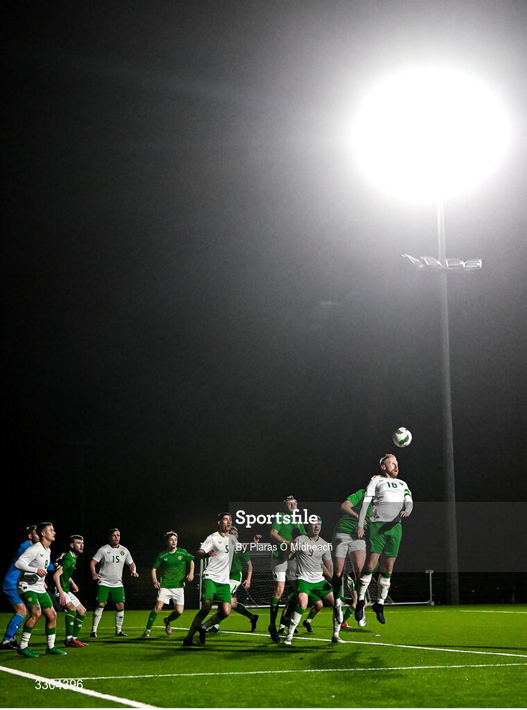 3 December 2025; Chris Kenny of Irish Defence Forces wins a header during the representative friendly match between Ireland Amateur and Irish Defence Forces at Wayside Celtic FC in Dublin. Photo by Piaras Ó Mídheach/Sportsfile