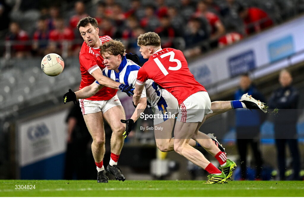 6 December 2025; Patrick Warren of Ballyboden St Enda’s in action against Athy players Niall Kelly, left, and Ronan Kelly during the AIB Leinster GAA Football Senior Club Championship final match between Athy of Kildare and Ballyboden St Enda's of Dublin at Croke Park in Dublin. Photo by Seb Daly/Sportsfile