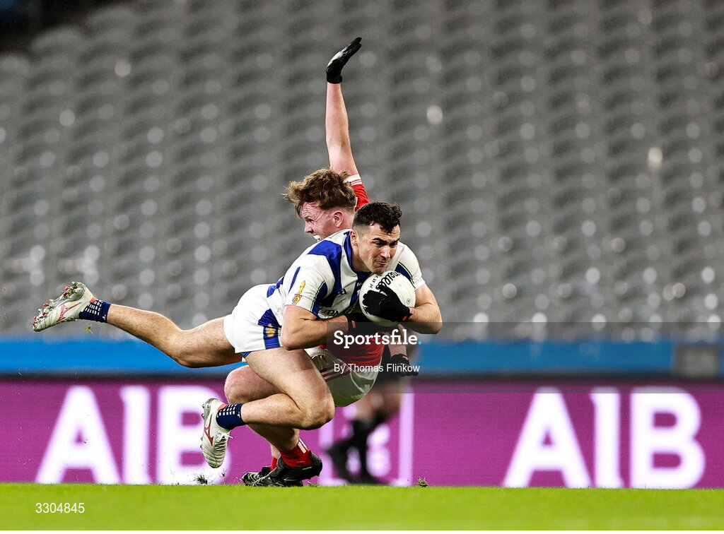 6 December 2025; Colm Basquel of Ballyboden St Enda’s is tackled by Athy during the AIB Leinster GAA Football Senior Club Championship final match between Athy of Kildare and Ballyboden St Enda's of Dublin at Croke Park in Dublin. Photo by Thomas Flinkow/Sportsfile