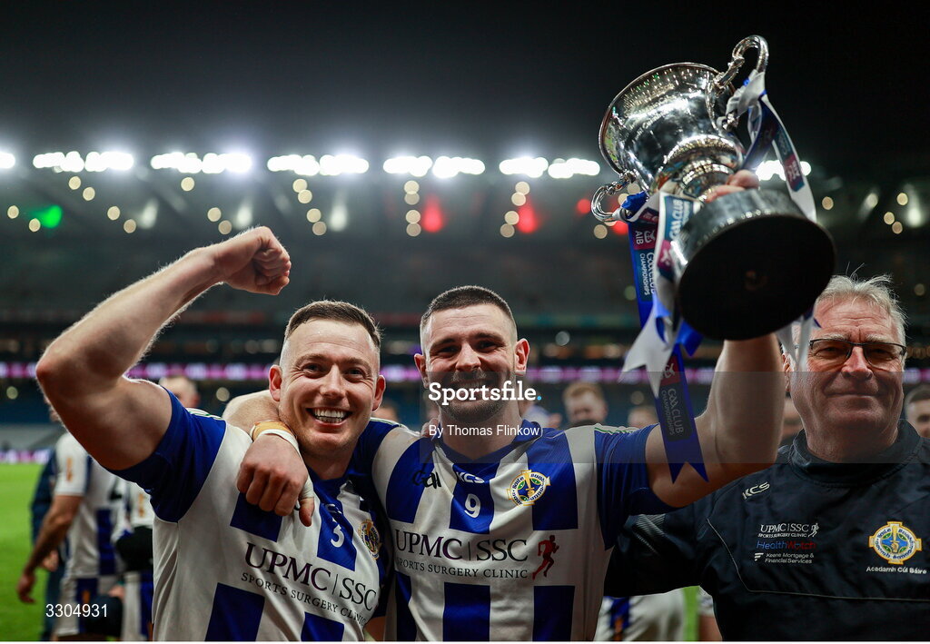 6 December 2025; Ballyboden St Enda's players Cathal Flaherty, left, and James Holland celebrate with the Seán McCabe Cup after their side's victory the AIB Leinster GAA Football Senior Club Championship final match between Athy of Kildare and Ballyboden St Enda's of Dublin at Croke Park in Dublin. Photo by Thomas Flinkow/Sportsfile